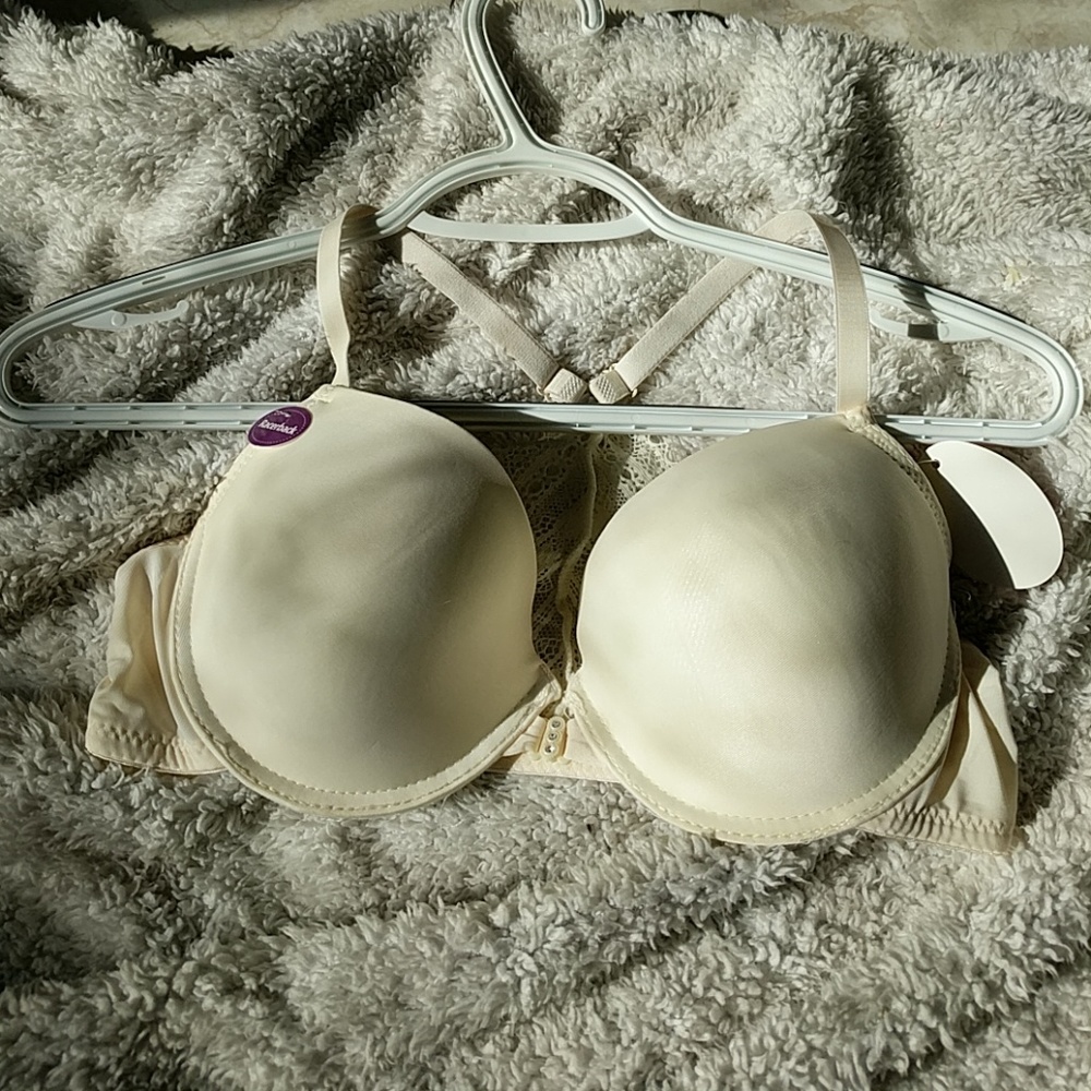 White, wired, lace racerback, front clasp bra.